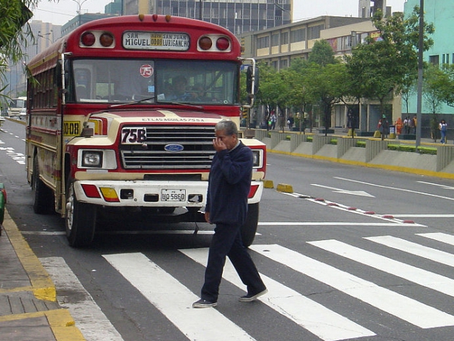 You're in your car and pedestrians are trying to cross the road at a spot that isn't a pedestrian crossing zone. What do you do?