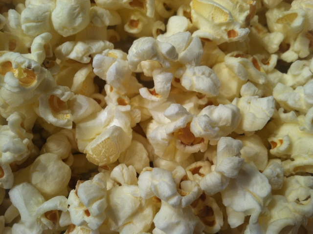 Would you rather snack on popcorn or cheese doodles?